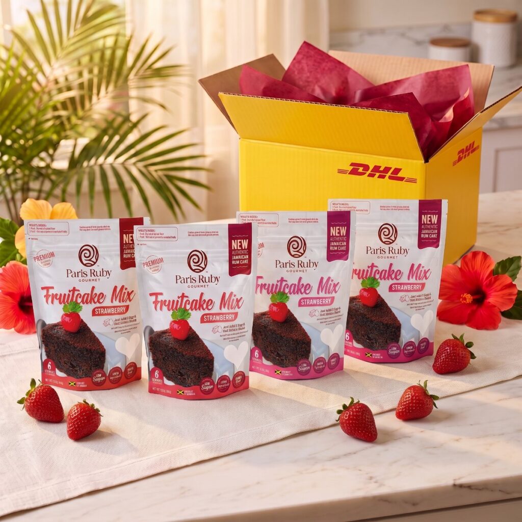 Four Strawberry Paris Ruby Fruitcake Mix packs beside an open yellow DHL Express box